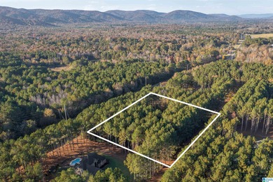 Discover your dream homesite on this expansive 2.35-acre estate on Pine Hill Country Club in Alabama - for sale on GolfHomes.com, golf home, golf lot