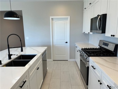 Welcome to your dream home in the prestigious Laughlin Ranch on Laughlin Ranch Golf Club in Arizona - for sale on GolfHomes.com, golf home, golf lot