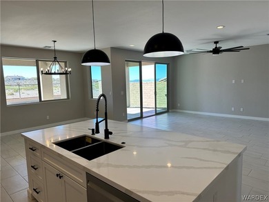 Welcome to your dream home in the prestigious Laughlin Ranch on Laughlin Ranch Golf Club in Arizona - for sale on GolfHomes.com, golf home, golf lot