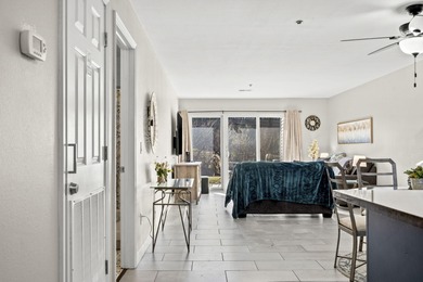 Wake up to the gentle shimmer of Lake Taneycomo right outside on Pointe Royale Village Country Club in Missouri - for sale on GolfHomes.com, golf home, golf lot