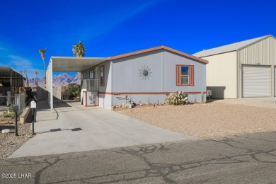 Step into this furnished 3-bedroom, 2-bath manufactured home on The Refuge Golf and Country Club in Arizona - for sale on GolfHomes.com, golf home, golf lot