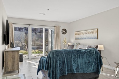 Wake up to the gentle shimmer of Lake Taneycomo right outside on Pointe Royale Village Country Club in Missouri - for sale on GolfHomes.com, golf home, golf lot