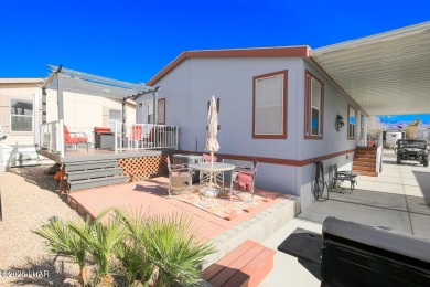 Step into this furnished 3-bedroom, 2-bath manufactured home on The Refuge Golf and Country Club in Arizona - for sale on GolfHomes.com, golf home, golf lot