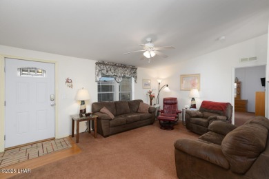 Step into this furnished 3-bedroom, 2-bath manufactured home on The Refuge Golf and Country Club in Arizona - for sale on GolfHomes.com, golf home, golf lot