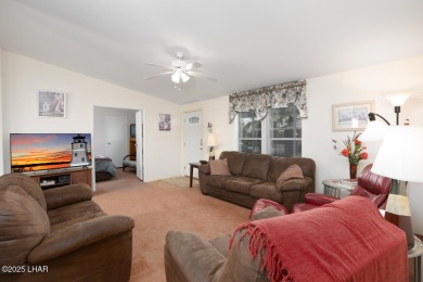 Step into this furnished 3-bedroom, 2-bath manufactured home on The Refuge Golf and Country Club in Arizona - for sale on GolfHomes.com, golf home, golf lot