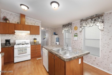Step into this furnished 3-bedroom, 2-bath manufactured home on The Refuge Golf and Country Club in Arizona - for sale on GolfHomes.com, golf home, golf lot