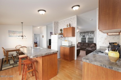 Step into this furnished 3-bedroom, 2-bath manufactured home on The Refuge Golf and Country Club in Arizona - for sale on GolfHomes.com, golf home, golf lot