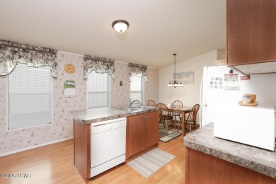 Step into this furnished 3-bedroom, 2-bath manufactured home on The Refuge Golf and Country Club in Arizona - for sale on GolfHomes.com, golf home, golf lot