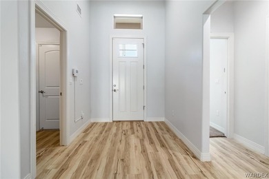 CUSTOM AND LIKE BRAND NEW! BUILT IN 2023, THIS 3 BEDROOM, 2 BATH on Desert Lakes Golf Course in Arizona - for sale on GolfHomes.com, golf home, golf lot