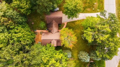 Welcome to this 3-bedroom, 2-bath home in the desirable Michaywe on Michaywe Pines Course in Michigan - for sale on GolfHomes.com, golf home, golf lot