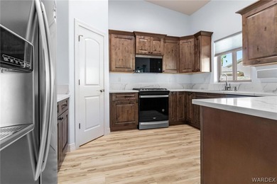 CUSTOM AND LIKE BRAND NEW! BUILT IN 2023, THIS 3 BEDROOM, 2 BATH on Desert Lakes Golf Course in Arizona - for sale on GolfHomes.com, golf home, golf lot