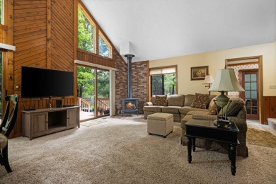 Welcome to this 3-bedroom, 2-bath home in the desirable Michaywe on Michaywe Pines Course in Michigan - for sale on GolfHomes.com, golf home, golf lot