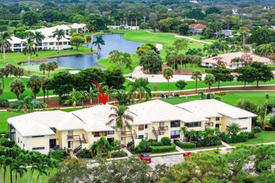 Captivating golf course & lake views grace your windows and on Quail Ridge Golf Course and Country Club in Florida - for sale on GolfHomes.com, golf home, golf lot