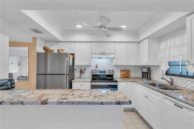 Highly sought after ground floor condo on demand Capri Isles on Capri Isle Golf Club in Florida - for sale on GolfHomes.com, golf home, golf lot
