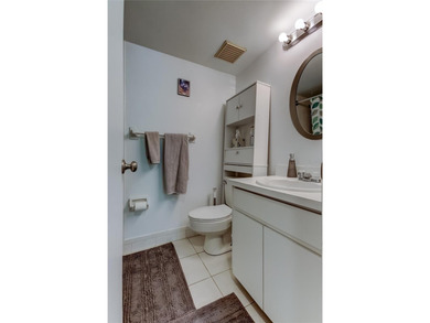 Picture perfect, move-in ready condo, with beautiful private on East Lake Woodlands Country Club in Florida - for sale on GolfHomes.com, golf home, golf lot