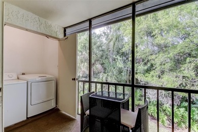 Picture perfect, move-in ready condo, with beautiful private on East Lake Woodlands Country Club in Florida - for sale on GolfHomes.com, golf home, golf lot