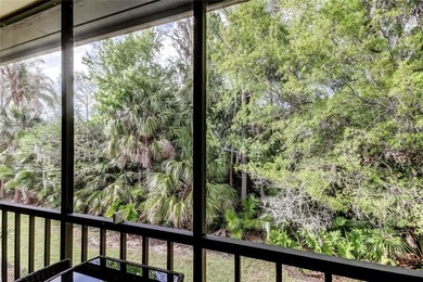 Picture perfect, move-in ready condo, with beautiful private on East Lake Woodlands Country Club in Florida - for sale on GolfHomes.com, golf home, golf lot