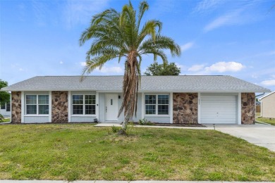 Welcome to this charming 2-bedroom, 2-bathroom home nestled in on Duffys Golf Center in Florida - for sale on GolfHomes.com, golf home, golf lot