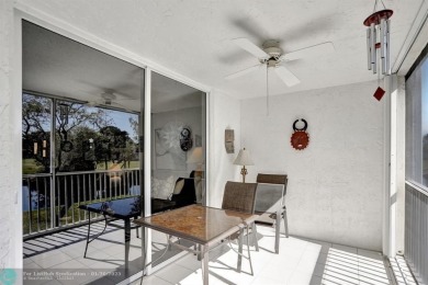 SOUTH EAST EXPOSURE AT SCREENED BALCONY. (that's a good thing) on Oriole Golf and Tennis Club in Florida - for sale on GolfHomes.com, golf home, golf lot