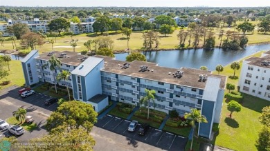 SOUTH EAST EXPOSURE AT SCREENED BALCONY. (that's a good thing) on Oriole Golf and Tennis Club in Florida - for sale on GolfHomes.com, golf home, golf lot