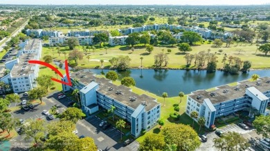 SOUTH EAST EXPOSURE AT SCREENED BALCONY. (that's a good thing) on Oriole Golf and Tennis Club in Florida - for sale on GolfHomes.com, golf home, golf lot