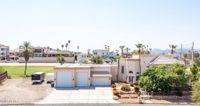 Nestled on the 4th fairway, this stunning 5,577 sq. ft. estate on London Bridge Golf Course in Arizona - for sale on GolfHomes.com, golf home, golf lot