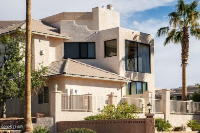 Nestled on the 4th fairway, this stunning 5,577 sq. ft. estate on London Bridge Golf Course in Arizona - for sale on GolfHomes.com, golf home, golf lot
