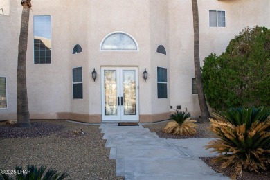 Nestled on the 4th fairway, this stunning 5,577 sq. ft. estate on London Bridge Golf Course in Arizona - for sale on GolfHomes.com, golf home, golf lot