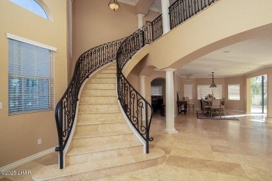 Nestled on the 4th fairway, this stunning 5,577 sq. ft. estate on London Bridge Golf Course in Arizona - for sale on GolfHomes.com, golf home, golf lot