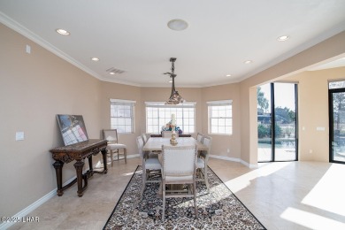 Nestled on the 4th fairway, this stunning 5,577 sq. ft. estate on London Bridge Golf Course in Arizona - for sale on GolfHomes.com, golf home, golf lot