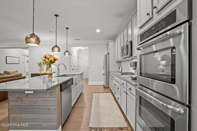 Welcome to this stunning golf front home located in Mid South on Mid South Club in North Carolina - for sale on GolfHomes.com, golf home, golf lot