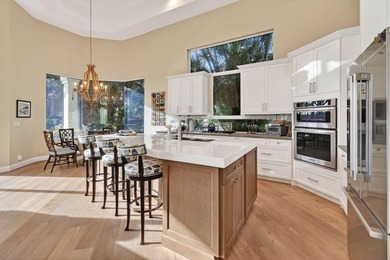 A prized location with sweeping panoramic golf and water views on BallenIsles Golf and Country Club in Florida - for sale on GolfHomes.com, golf home, golf lot