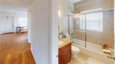 See the Matterport Virtual Tour!  This is a perfectly cozy 2nd on Sunrise Lakes Phase III in Florida - for sale on GolfHomes.com, golf home, golf lot