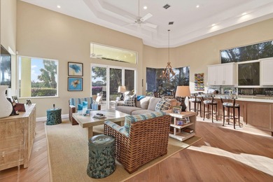 A prized location with sweeping panoramic golf and water views on BallenIsles Golf and Country Club in Florida - for sale on GolfHomes.com, golf home, golf lot