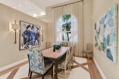 A prized location with sweeping panoramic golf and water views on BallenIsles Golf and Country Club in Florida - for sale on GolfHomes.com, golf home, golf lot