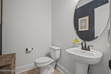 Welcome to this stunning golf front home located in Mid South on Mid South Club in North Carolina - for sale on GolfHomes.com, golf home, golf lot