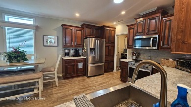 Welcome to 3944 Scramble Drive, a 2020 Skyline home located in on The Riverside Golf Club in Florida - for sale on GolfHomes.com, golf home, golf lot