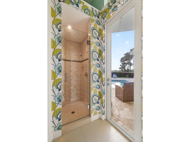 A prized location with sweeping panoramic golf and water views on BallenIsles Golf and Country Club in Florida - for sale on GolfHomes.com, golf home, golf lot