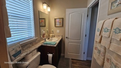 Welcome to 3944 Scramble Drive, a 2020 Skyline home located in on The Riverside Golf Club in Florida - for sale on GolfHomes.com, golf home, golf lot