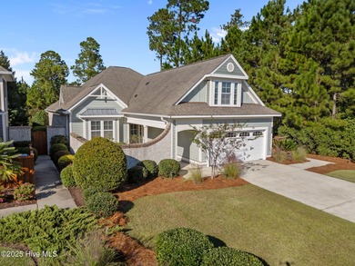 Experience refined coastal living in this beautifully designed on Cape Fear National At Brunswick Forest in North Carolina - for sale on GolfHomes.com, golf home, golf lot