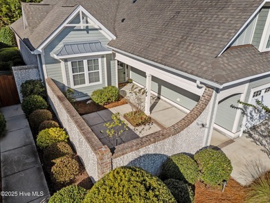 Experience refined coastal living in this beautifully designed on Cape Fear National At Brunswick Forest in North Carolina - for sale on GolfHomes.com, golf home, golf lot