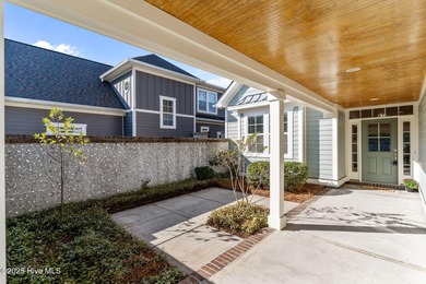 Experience refined coastal living in this beautifully designed on Cape Fear National At Brunswick Forest in North Carolina - for sale on GolfHomes.com, golf home, golf lot