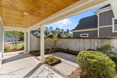 Experience refined coastal living in this beautifully designed on Cape Fear National At Brunswick Forest in North Carolina - for sale on GolfHomes.com, golf home, golf lot