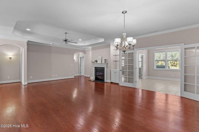 Experience refined coastal living in this beautifully designed on Cape Fear National At Brunswick Forest in North Carolina - for sale on GolfHomes.com, golf home, golf lot