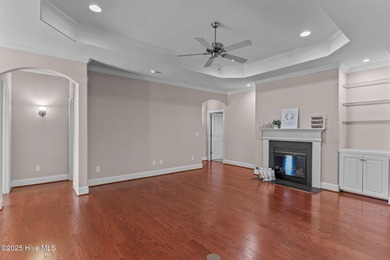 Experience refined coastal living in this beautifully designed on Cape Fear National At Brunswick Forest in North Carolina - for sale on GolfHomes.com, golf home, golf lot