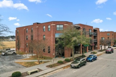 Contemporary condo with Cape Charles Harbor and Chesapeake Bay on Bay Creek Golf Club in Virginia - for sale on GolfHomes.com, golf home, golf lot