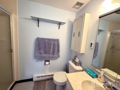 Welcome to Rossmoor! This inviting two-bedroom, two-bath on Rossmoor Golf Club in New Jersey - for sale on GolfHomes.com, golf home, golf lot
