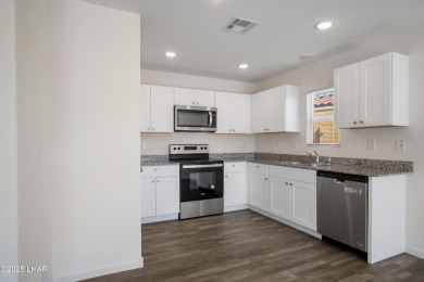 Discover this immaculate, nearly new home in Bullhead City's on Chaparral Golf and Country Club in Arizona - for sale on GolfHomes.com, golf home, golf lot