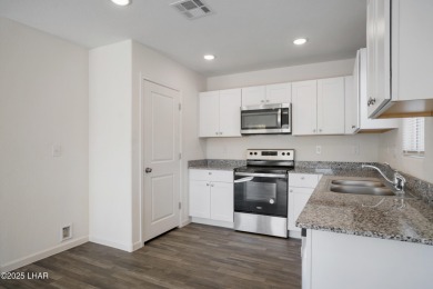 Discover this immaculate, nearly new home in Bullhead City's on Chaparral Golf and Country Club in Arizona - for sale on GolfHomes.com, golf home, golf lot