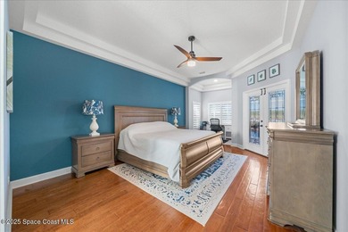 Step into this beautifully maintained pool home in the coveted on Viera East Golf Club in Florida - for sale on GolfHomes.com, golf home, golf lot